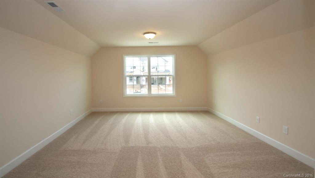 5706 Joshua Cain Road, Unit L0041 Charlotte, NC 28213 - Photo 11 of 23 an empty room with a window