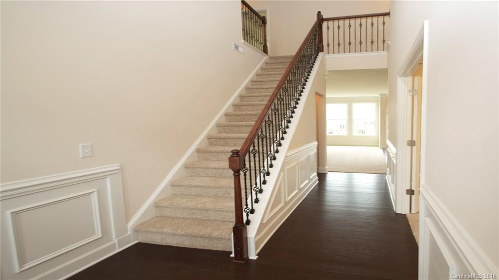 5706 Joshua Cain Road, Unit L0041 Charlotte, NC 28213 - Photo 13 of 23 a view of a hallway with staircase