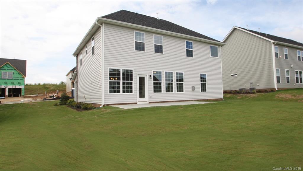 5706 Joshua Cain Road, Unit L0041 Charlotte, NC 28213 - Photo 14 of 23 a view of a house with backyard