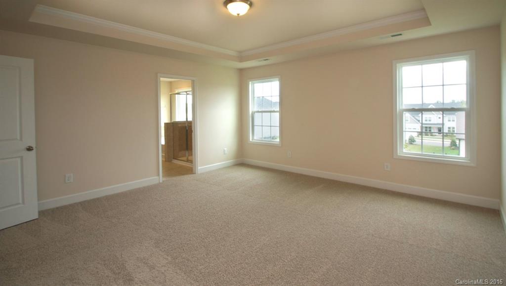 5706 Joshua Cain Road, Unit L0041 Charlotte, NC 28213 - Photo 23 of 23 an empty room with windows