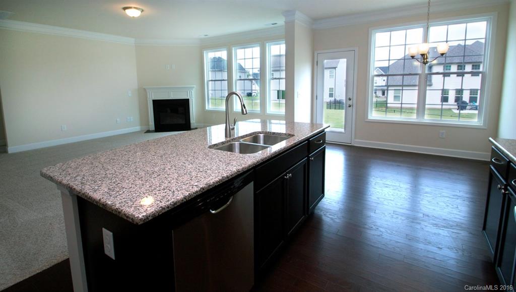 5706 Joshua Cain Road, Unit L0041 Charlotte, NC 28213 - Photo 5 of 23 a kitchen with counter space and windows