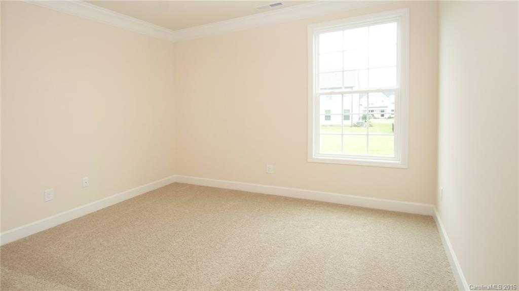 5706 Joshua Cain Road, Unit L0041 Charlotte, NC 28213 - Photo 8 of 23 an empty room with a window