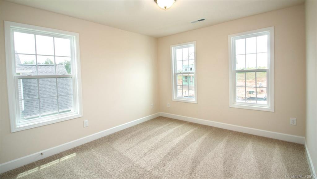 5706 Joshua Cain Road, Unit L0041 Charlotte, NC 28213 - Photo 9 of 23 an empty room with a window