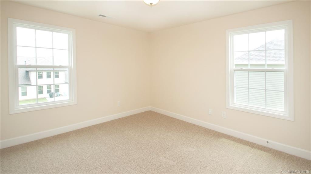 5706 Joshua Cain Road, Unit L0041 Charlotte, NC 28213 - Photo 10 of 23 an empty room with a window