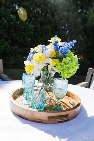 a living room with a sink furniture and a window