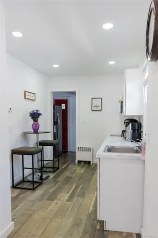 a outdoor space with patio furniture and a potted plant