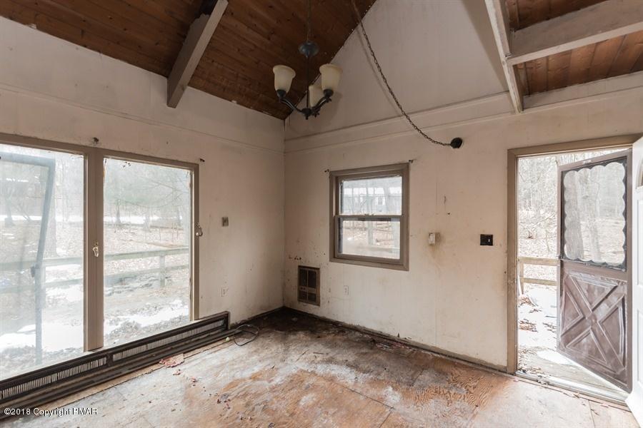 131 Rabbit Court Bushkill, PA 18324 - Photo 5 of 12 a view of an empty room with a window