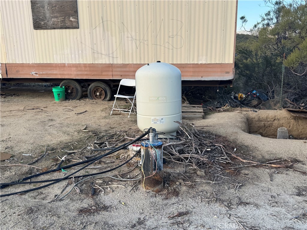 0 Springbrook Trail Anza, CA 92539 - Photo 4 of 13 a backyard of a house with table and chairs