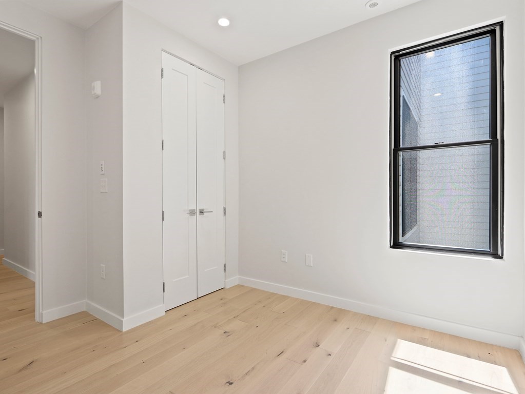 340 West 2nd Street, Unit 8 Boston, MA 02127 - Photo 16 of 38 a view of an empty room with a window