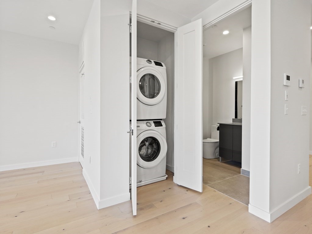 340 West 2nd Street, Unit 8 Boston, MA 02127 - Photo 17 of 38 a view of a storage & utility room with washer and dryer
