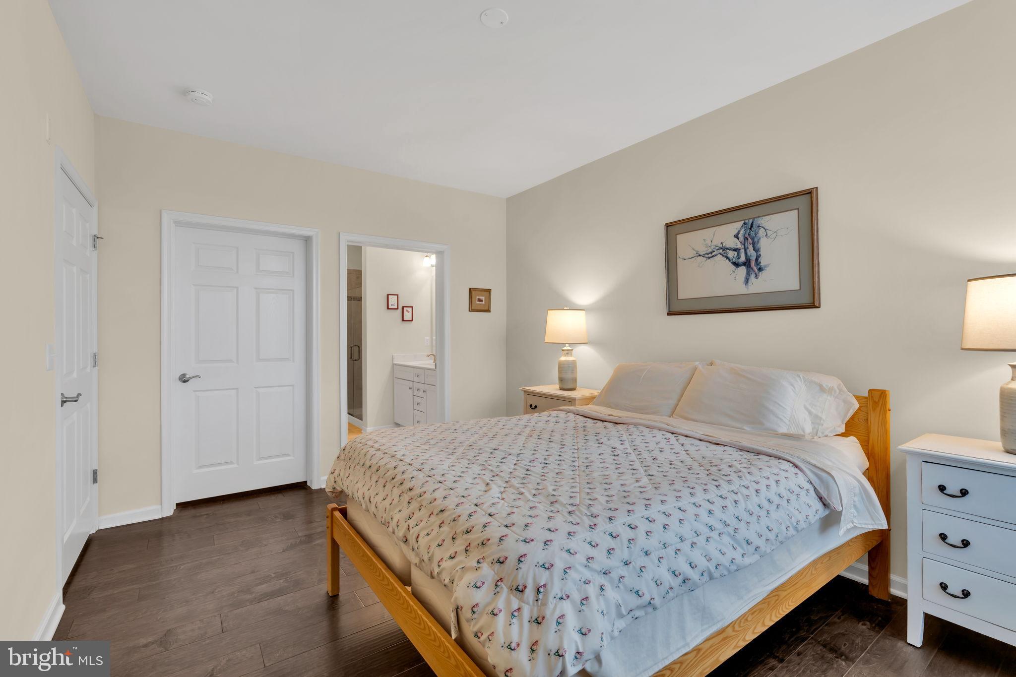 1044 Halifax Place Hamilton, NJ 08619 - Photo 14 of 39 a bedroom with a bed and painting on the wall