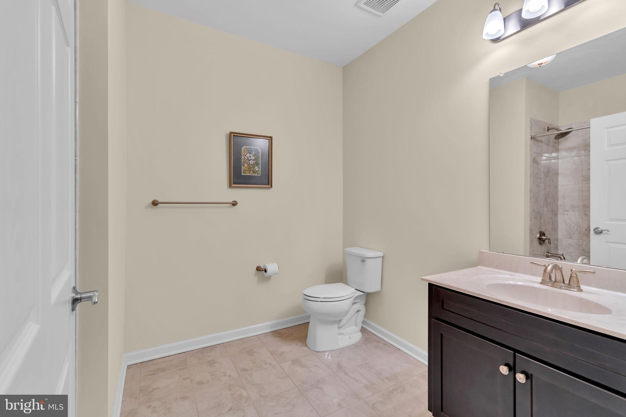 1044 Halifax Place Hamilton, NJ 08619 - Photo 20 of 39 a bathroom with a sink toilet and vanity