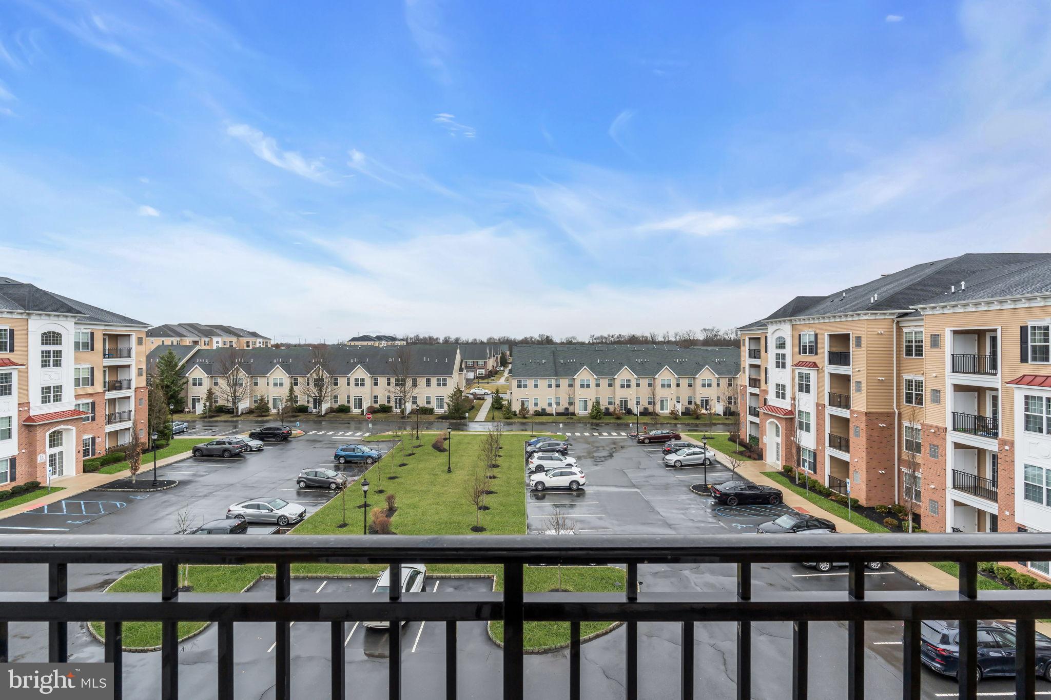 1044 Halifax Place Hamilton, NJ 08619 - Photo 25 of 39 a balcony with furniture and city view