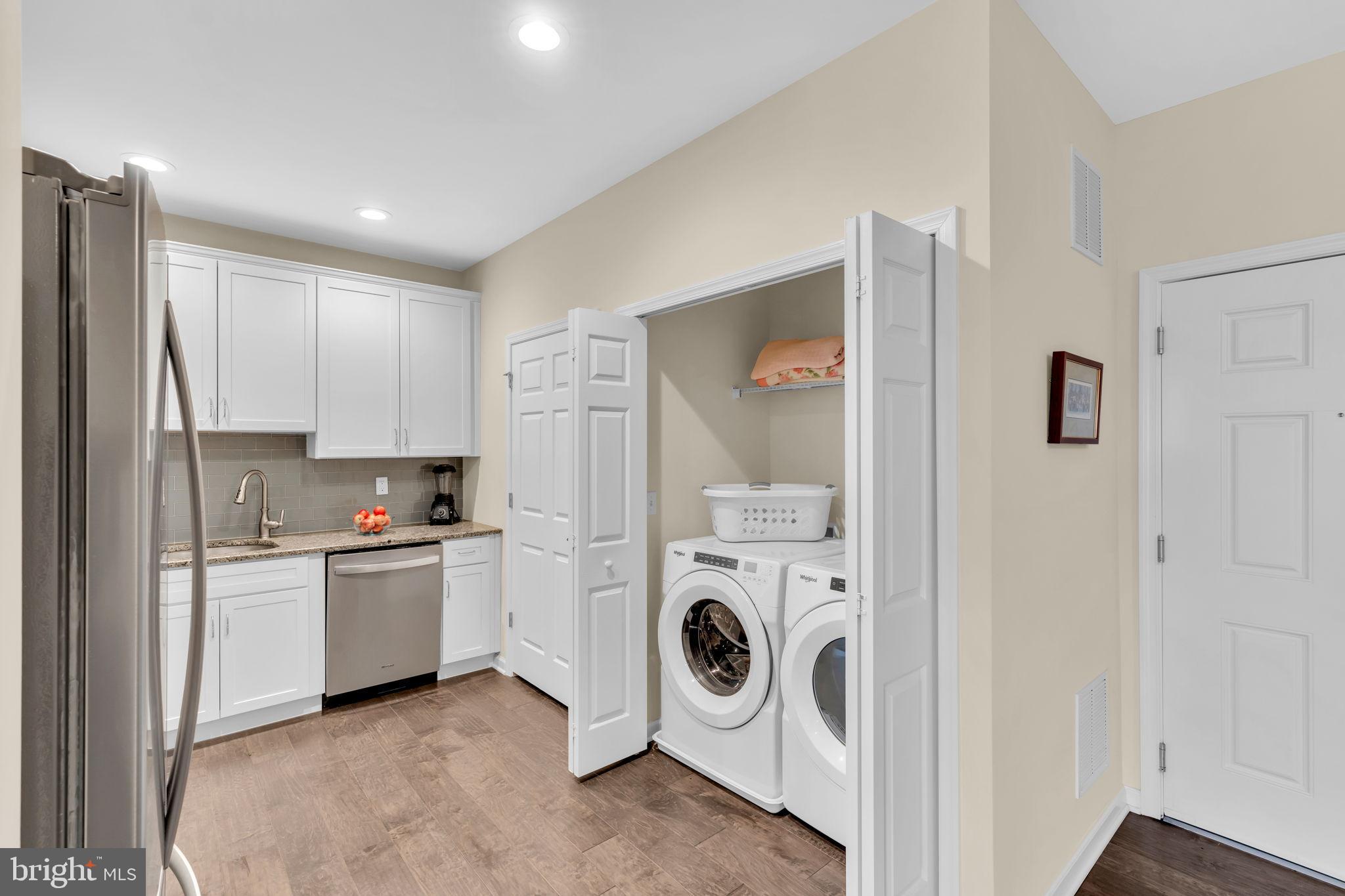 1044 Halifax Place Hamilton, NJ 08619 - Photo 10 of 39 a kitchen with cabinets and a refrigerator