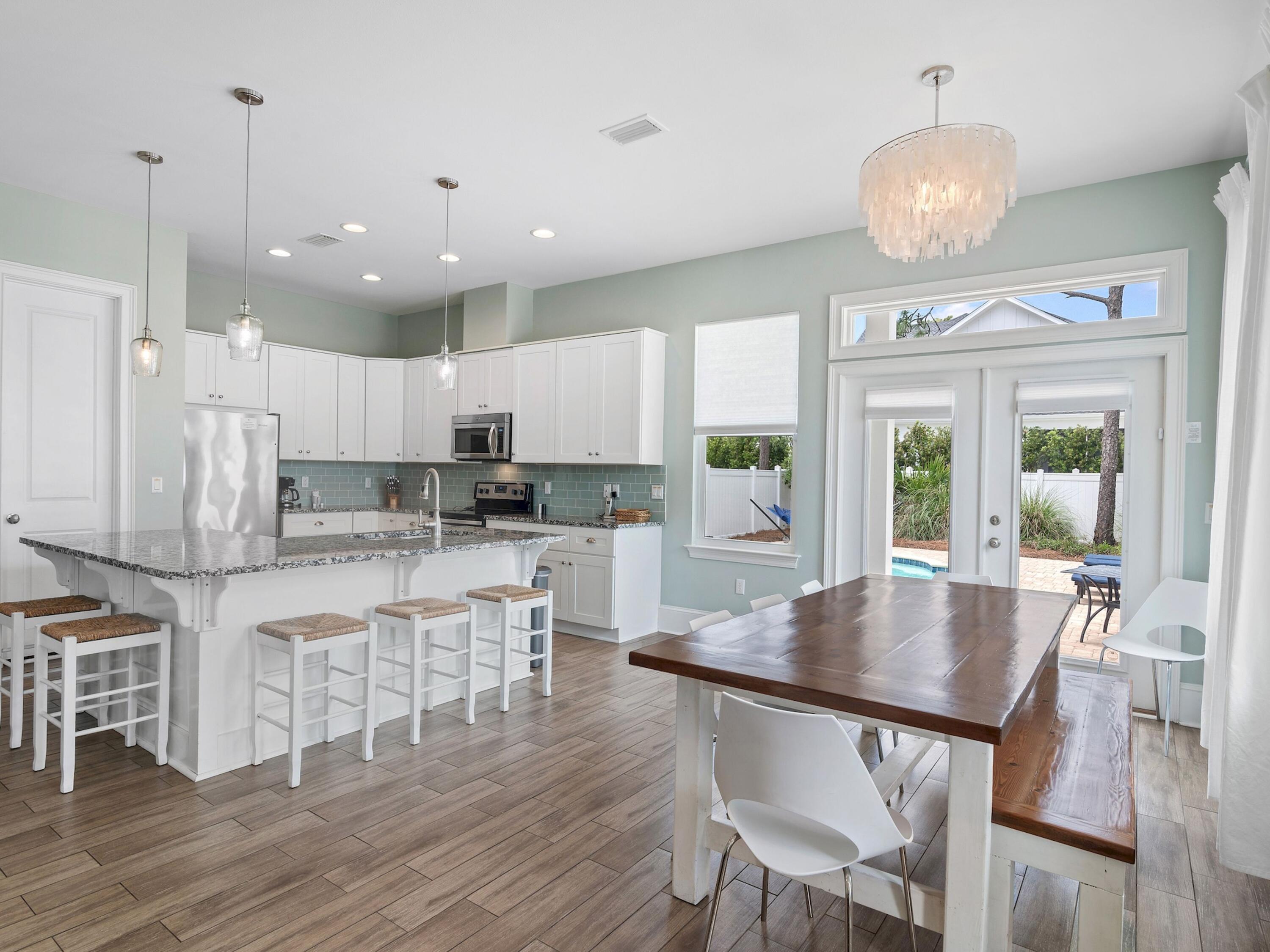 38 Elm Street Santa Rosa Beach, FL 32459 - Photo 7 of 53 Kitchen, dining and doors to the pool