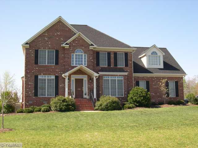 8502 Billet Place Oak Ridge, NC 27310 - Photo 1 of 11 Exterior Front. Beautiful Custom Brick Home.