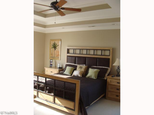8502 Billet Place Oak Ridge, NC 27310 - Photo 7 of 11 Master Bedroom. Large Master with double tray ceiling.