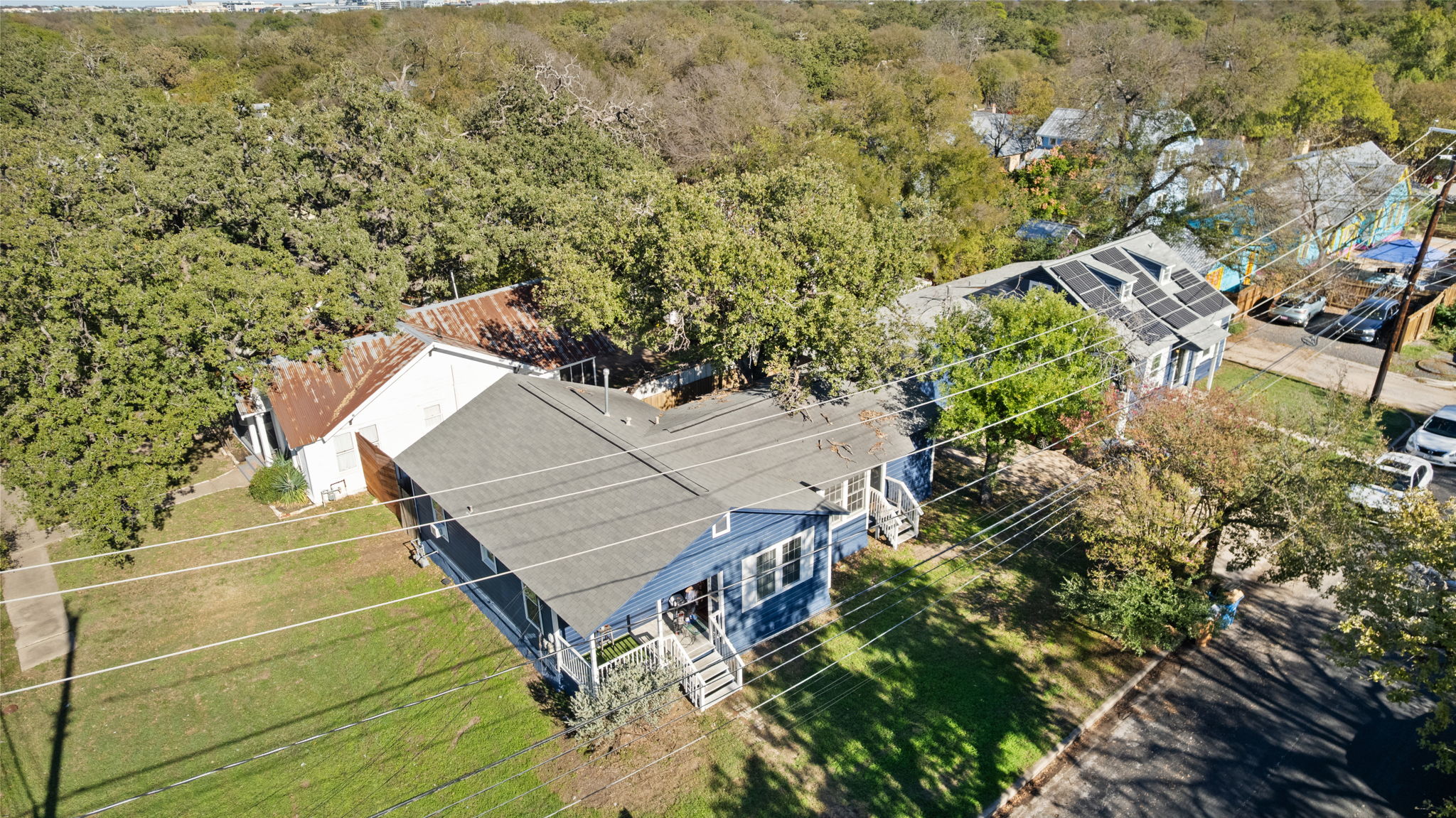 1202 East 29th Street, Unit A Austin, TX 78722 - Photo 33 of 37 a view of a balcony with chairs