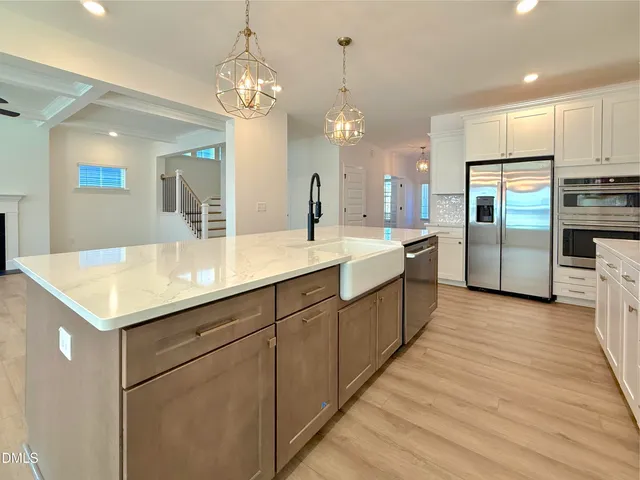 a kitchen with a stove and a microwave