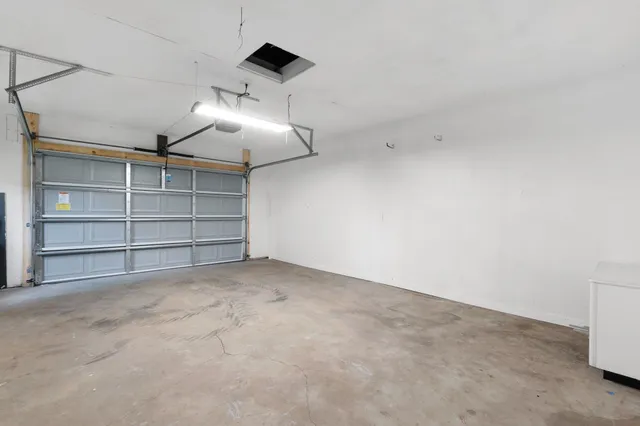 a view of room that has a ceiling fan