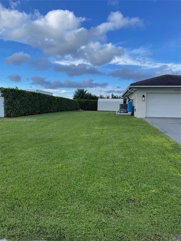 a bathroom with a sink toilet and a mirror
