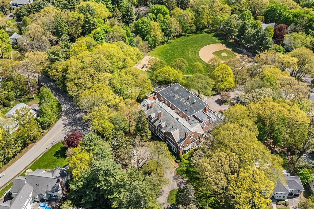 63 Garden Road, Unit C5 Wellesley, MA 02481 - Photo 28 of 30 a aerial view of a house with a yard and garden