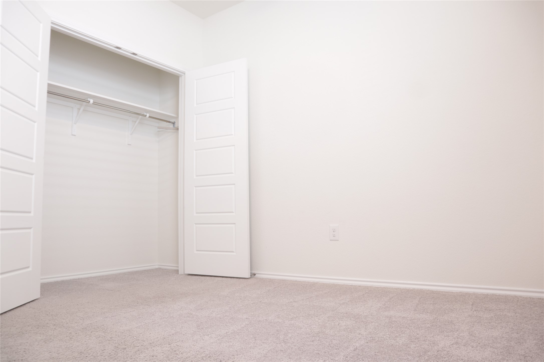 8111 Marigny Way Austin, TX 78744 - Photo 10 of 29 A well-proportioned bedroom offers new carpeting and a convenient closet.
