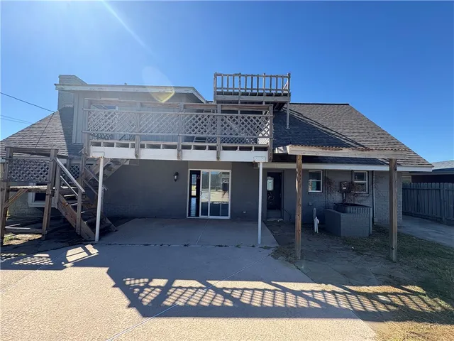 a view of a house with a patio