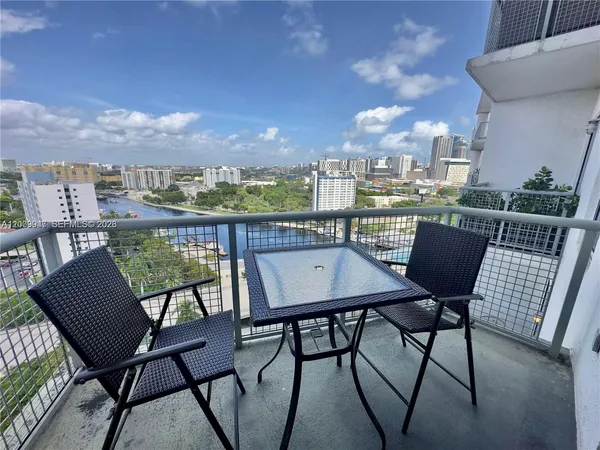 a view of a chairs and table on the terrace