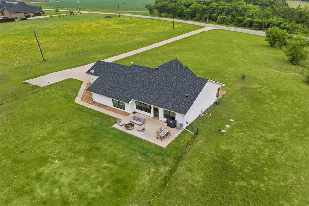 2990 Wilson Road Palmer, TX 75152 - Photo 36 of 40 a view of a house with a big yard