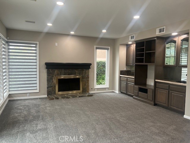 2871 North Roxbury Street Orange, CA 92867 - Photo 12 of 25 an empty room with furniture and a fireplace