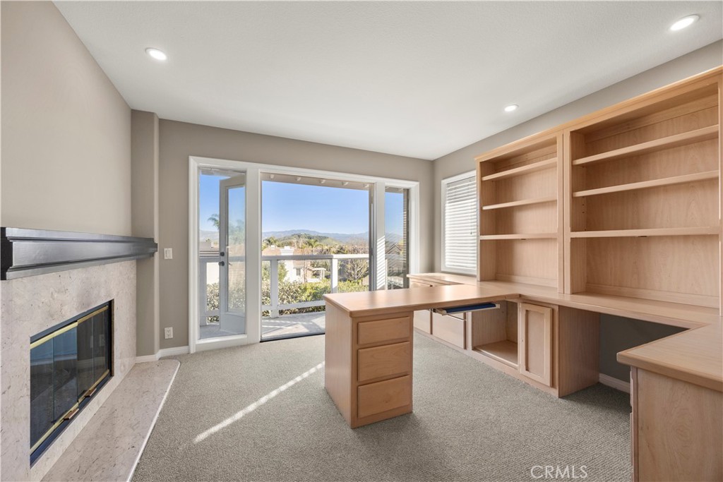2871 North Roxbury Street Orange, CA 92867 - Photo 21 of 38 a room with a large window and a kitchen counter top oven