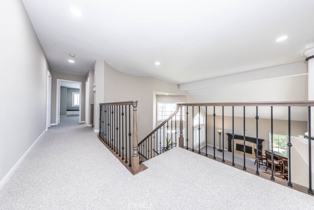 2871 North Roxbury Street Orange, CA 92867 - Photo 22 of 25 a view of staircase with white walls