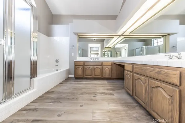 a large kitchen with a large window