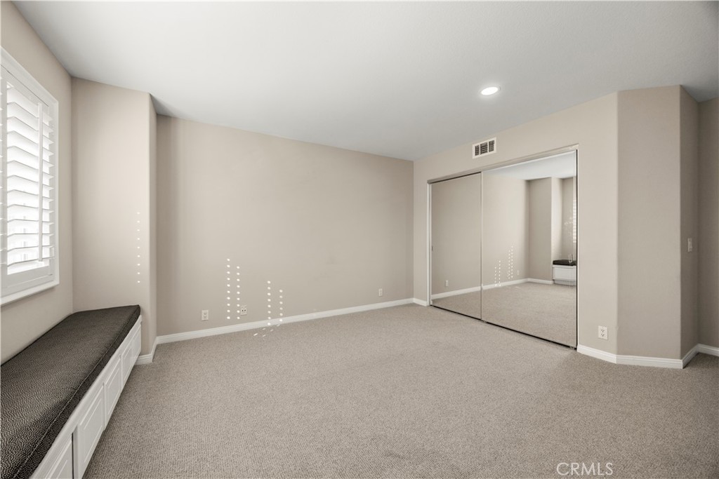 2871 North Roxbury Street Orange, CA 92867 - Photo 27 of 38 an empty room with windows