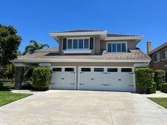 2871 North Roxbury Street Orange, CA 92867 - Photo 3 of 25 front view of a house with a large window