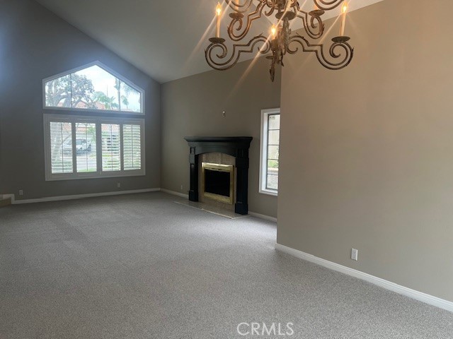 2871 North Roxbury Street Orange, CA 92867 - Photo 9 of 25 an empty room with windows and fireplace