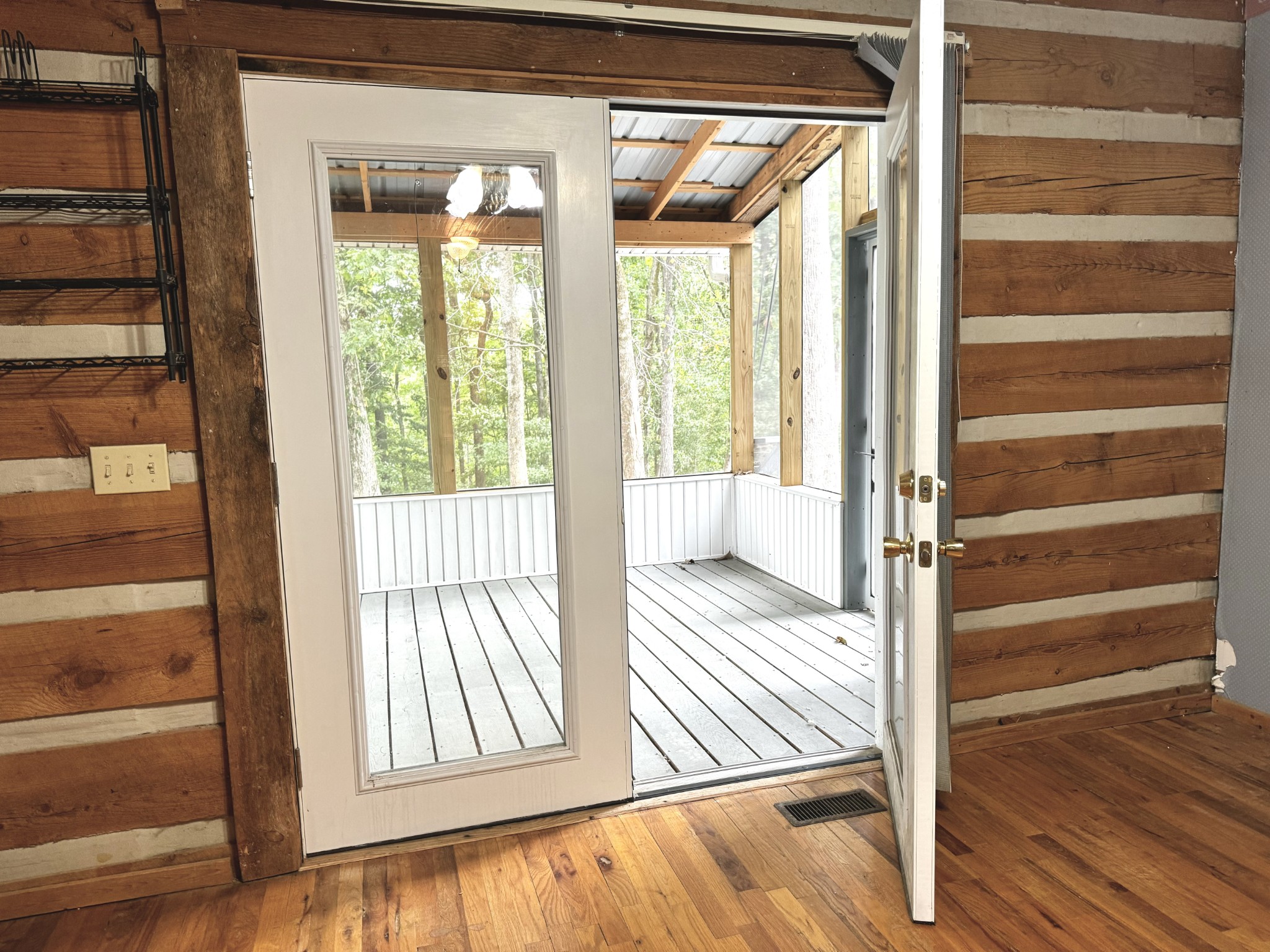 454 Chestnut Grove Road Morrison, TN 37357 - Photo 27 of 58 a view of a room with wooden floor and windows