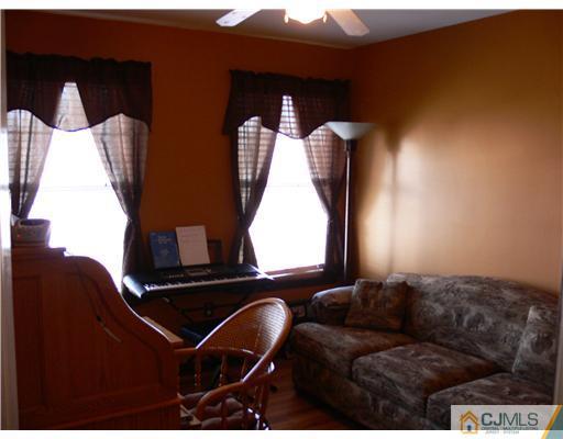 10 Bernadette Road Morganville, NJ 07751 - Photo 16 of 24 a living room with furniture