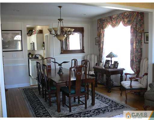 10 Bernadette Road Morganville, NJ 07751 - Photo 5 of 24 a view of a dining room with furniture window and wooden floor