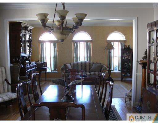 10 Bernadette Road Morganville, NJ 07751 - Photo 6 of 24 a view of a dining room with furniture window and wooden floor