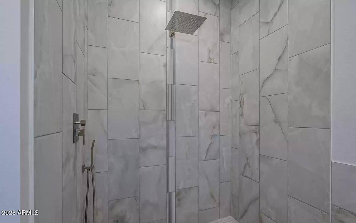 2511 East Broadway Road Phoenix, AZ 85040 - Photo 15 of 17 a bathroom with a shower