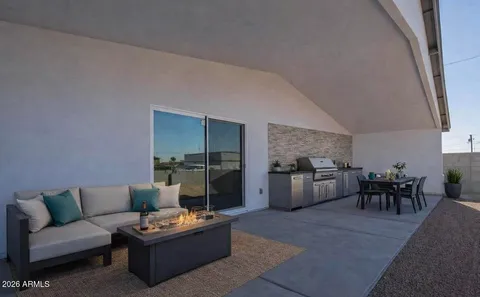 a living room with furniture and a table