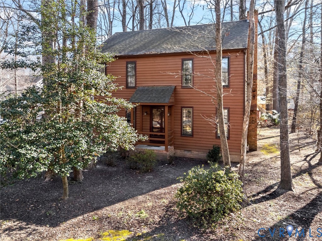4701 Black Oak Road North Chesterfield, VA 23237 - Photo 3 of 47 a front view of a house with garden