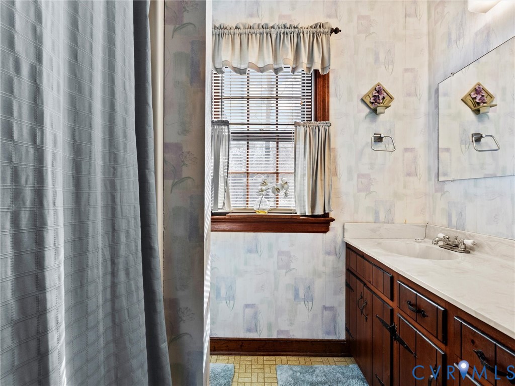 4701 Black Oak Road North Chesterfield, VA 23237 - Photo 35 of 47 a bathroom with a sink and a mirror