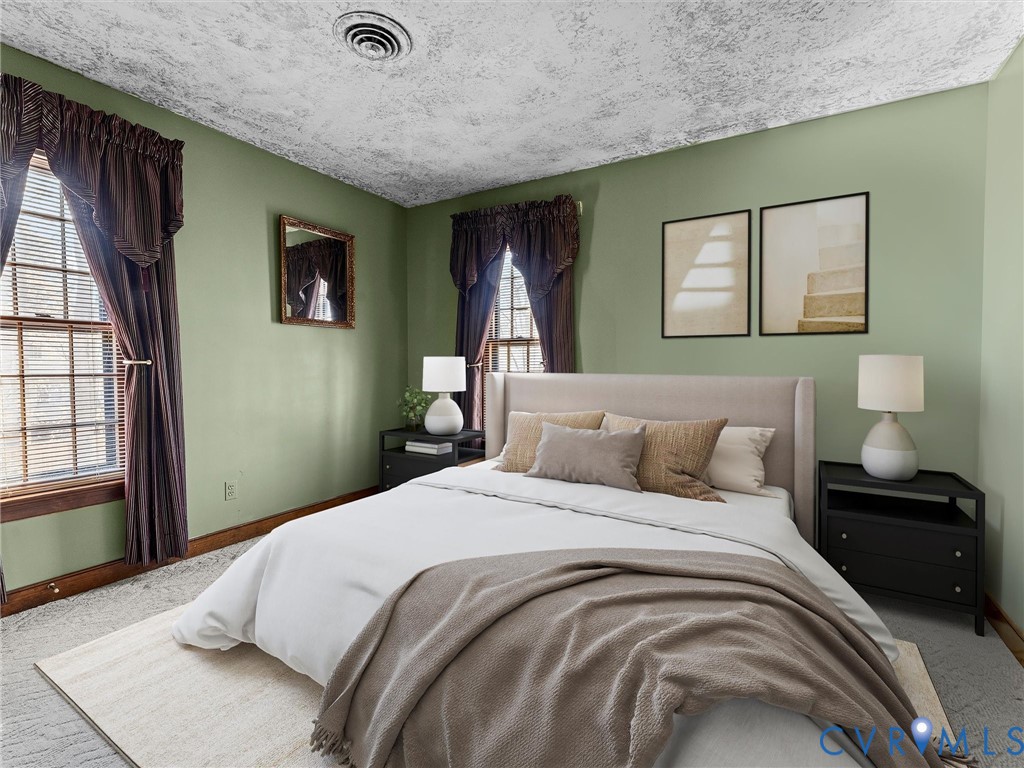 4701 Black Oak Road North Chesterfield, VA 23237 - Photo 38 of 47 a bedroom with a bed and a painting on the wall