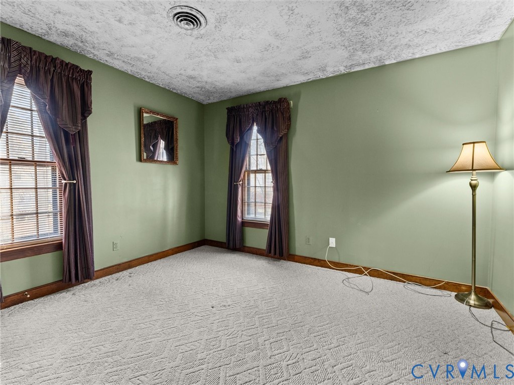 4701 Black Oak Road North Chesterfield, VA 23237 - Photo 39 of 47 an empty room with windows