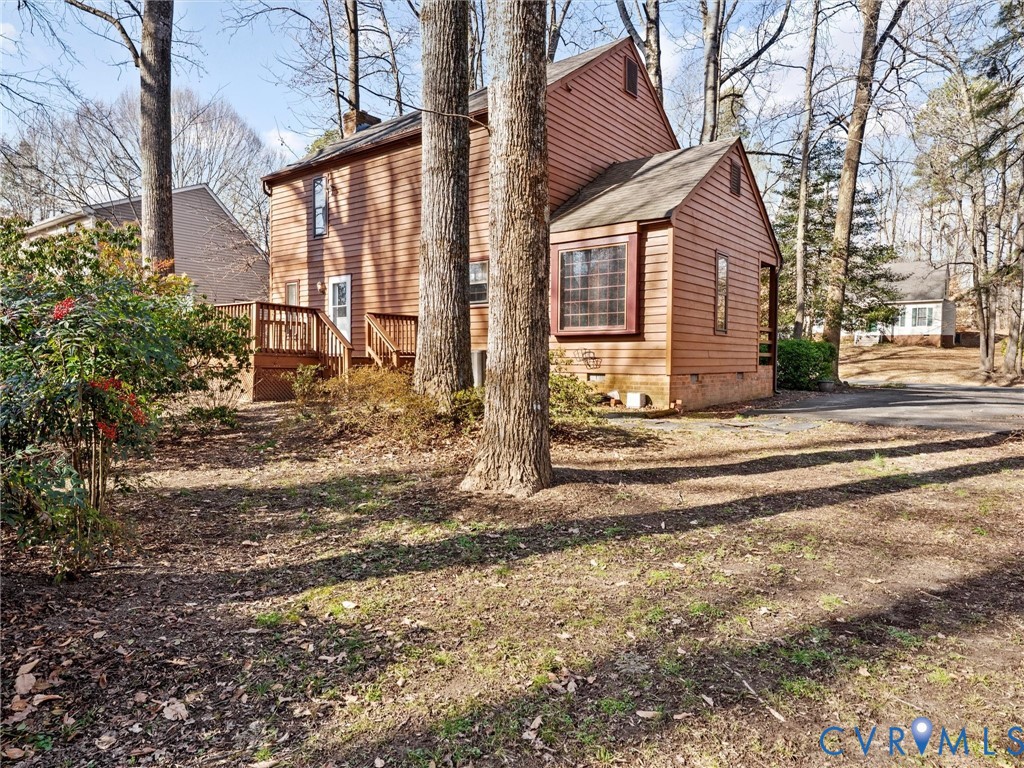 4701 Black Oak Road North Chesterfield, VA 23237 - Photo 44 of 47 a view of a house with a yard and large tree