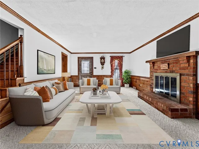 a kitchen with stainless steel appliances granite countertop a refrigerator a stove and a sink