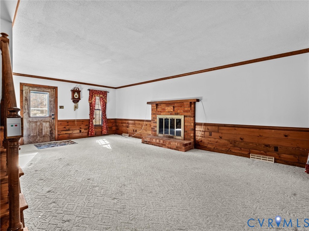 4701 Black Oak Road North Chesterfield, VA 23237 - Photo 7 of 47 a view of a livingroom with furniture and a fireplace